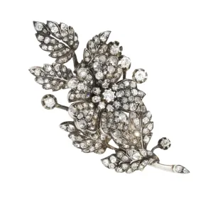 A XIX Century yellow gold and silver trembleuse brooch with old-cut and rose-cut diamonds. France, 1860.