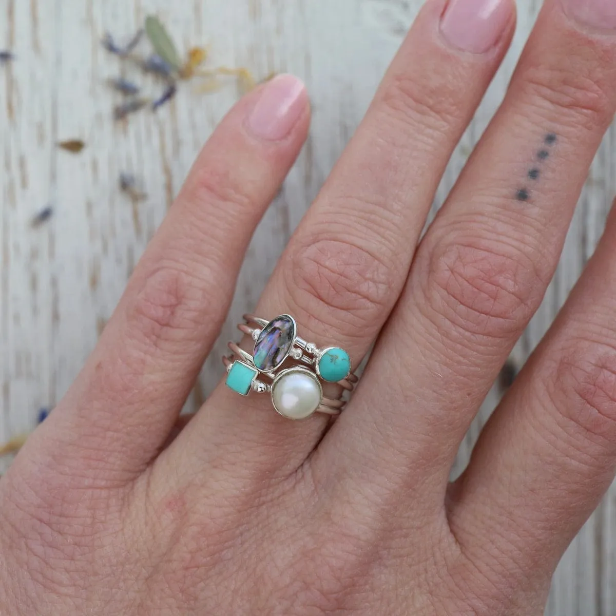 Delicate Compressed Turquoise Round Silver Ring