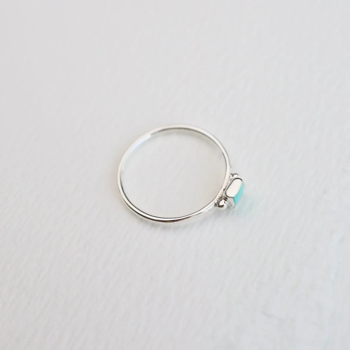 Delicate Compressed Turquoise Square Silver Ring