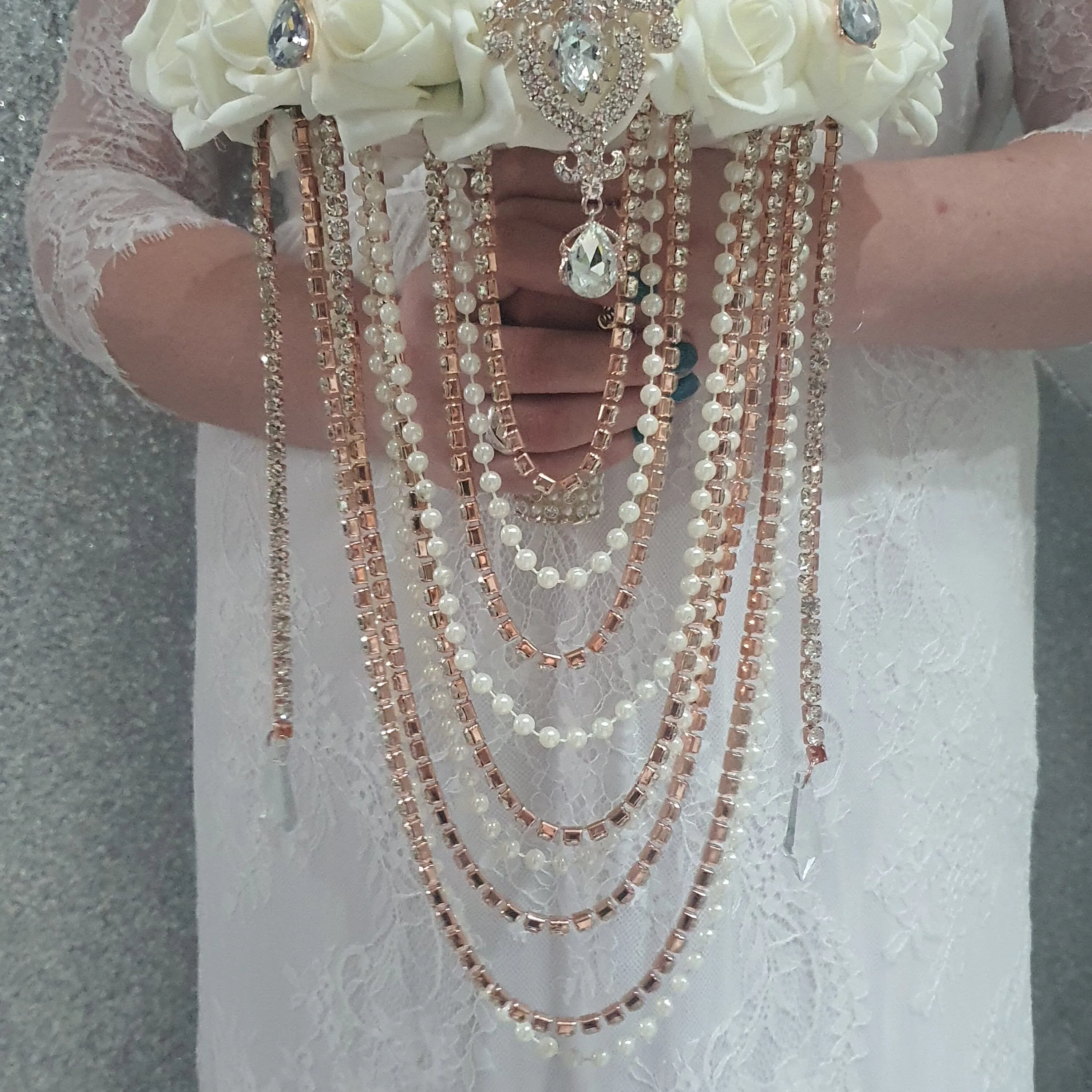 Rose gold Brooch and Pearl drape bouquet by Crystal wedding uk