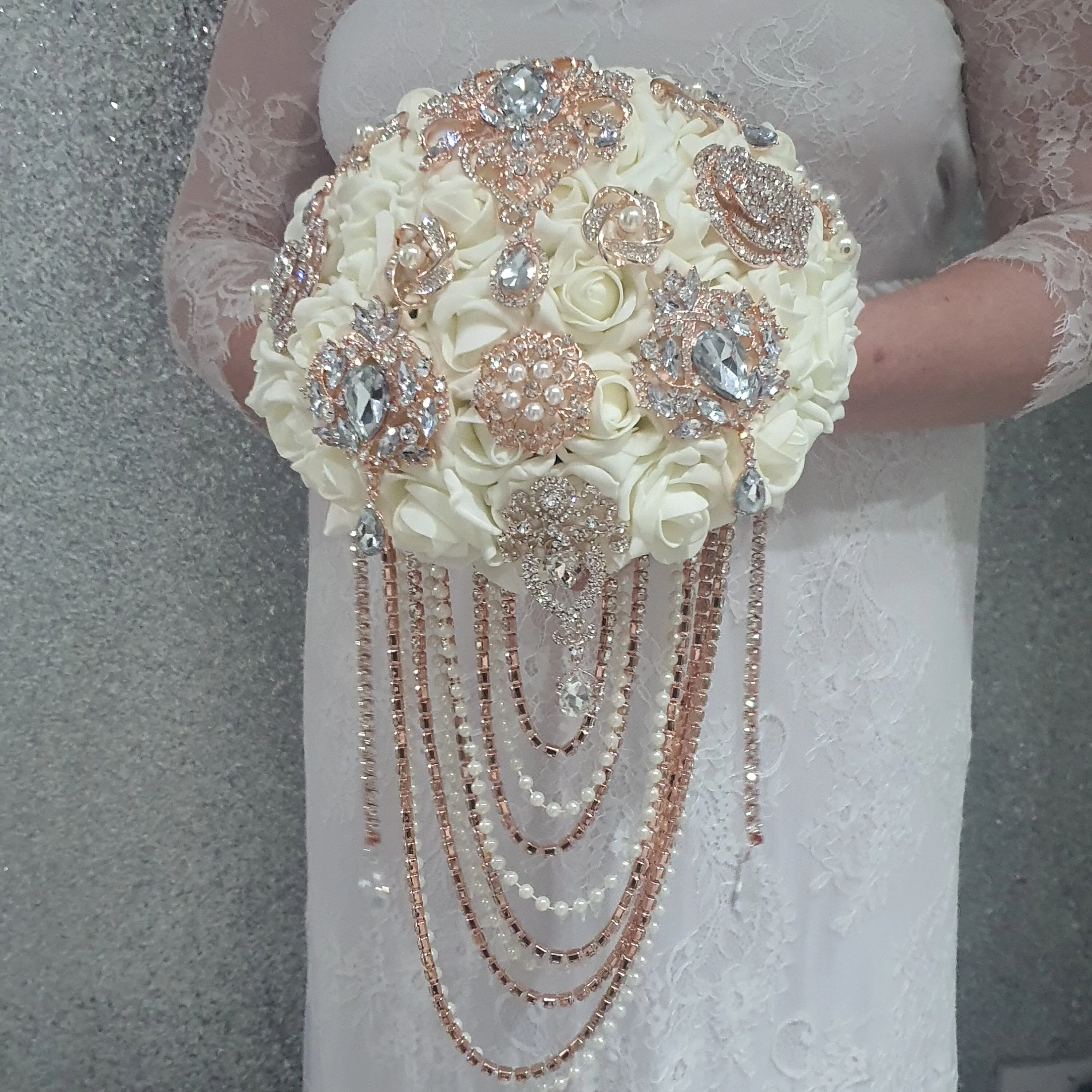 Rose gold Brooch and Pearl drape bouquet by Crystal wedding uk