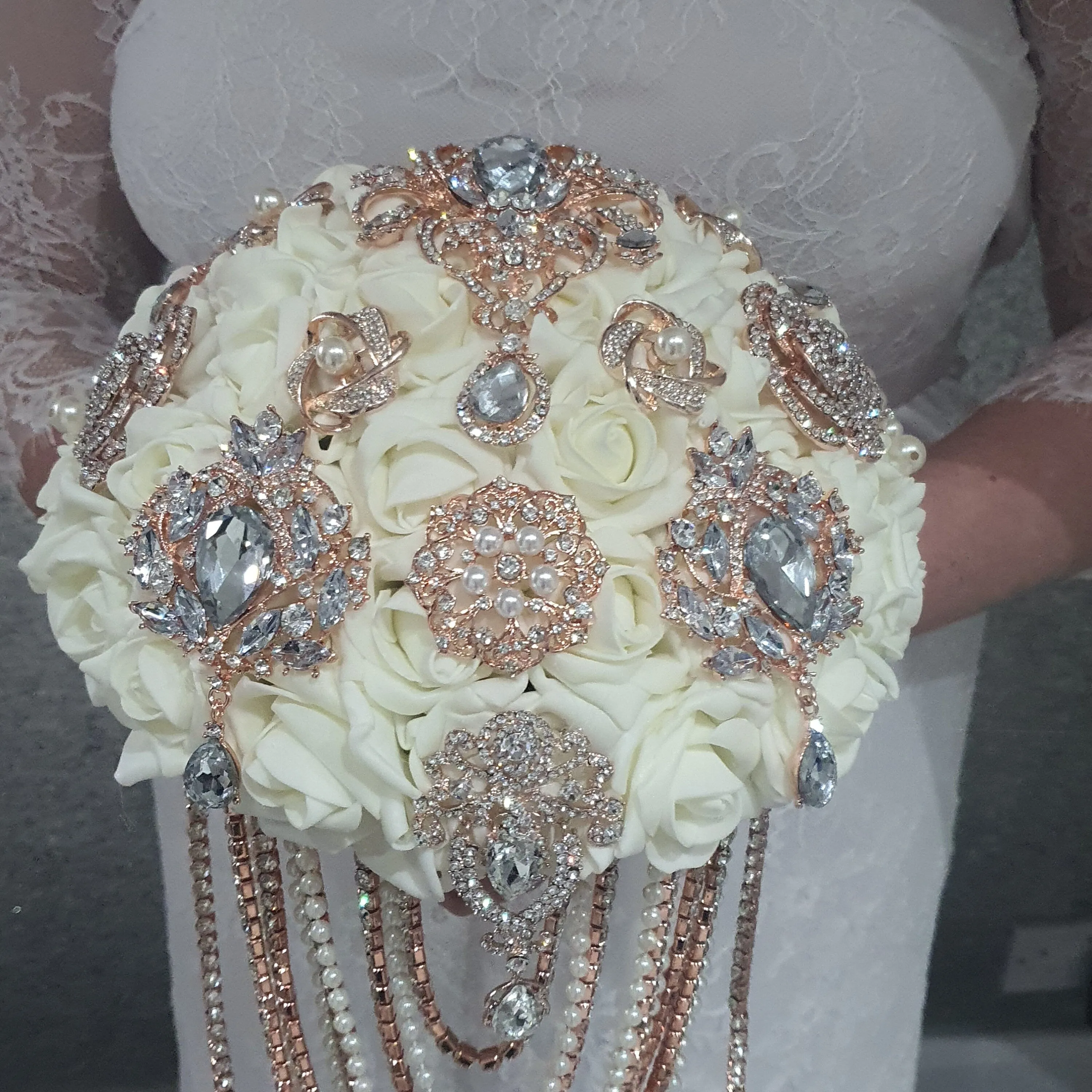 Rose gold Brooch and Pearl drape bouquet by Crystal wedding uk