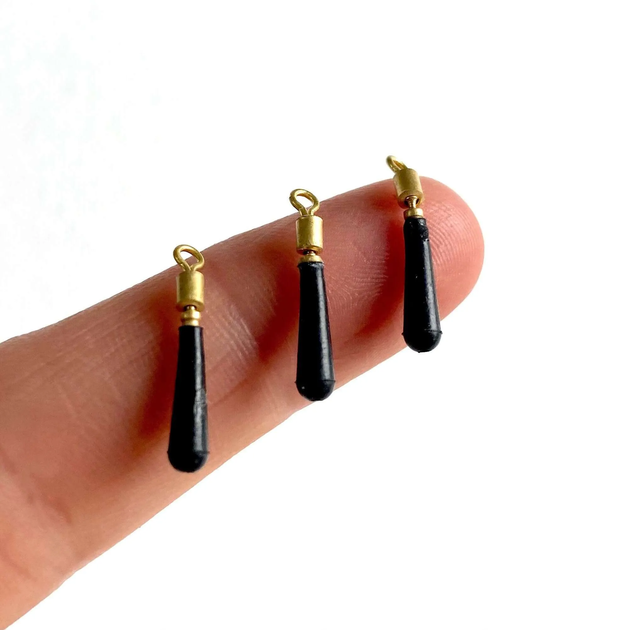 Tiny black rubber tear drop pendants