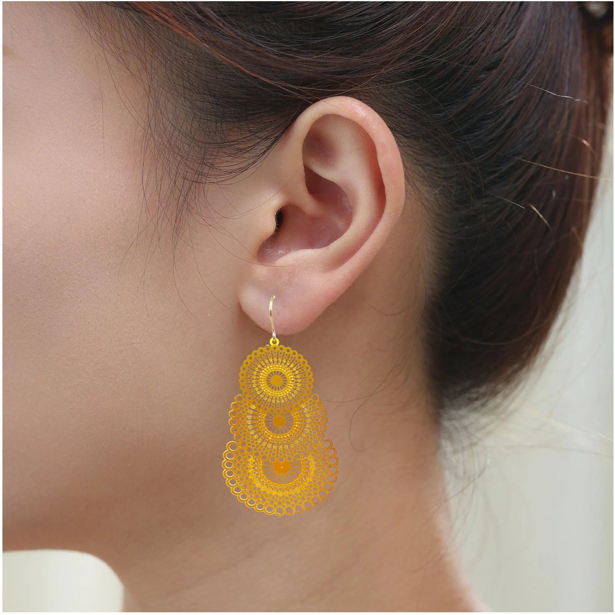 Triple gold disc drop earring